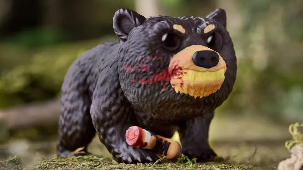 Funko Reveals 'Cocaine Bear' With Bloody Leg Pop Available for Pre-Order